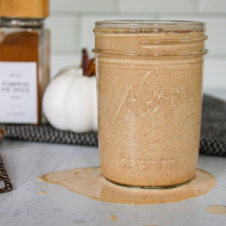 Pumpkin Spice Coffee Creamer in a mason jar with some spilled