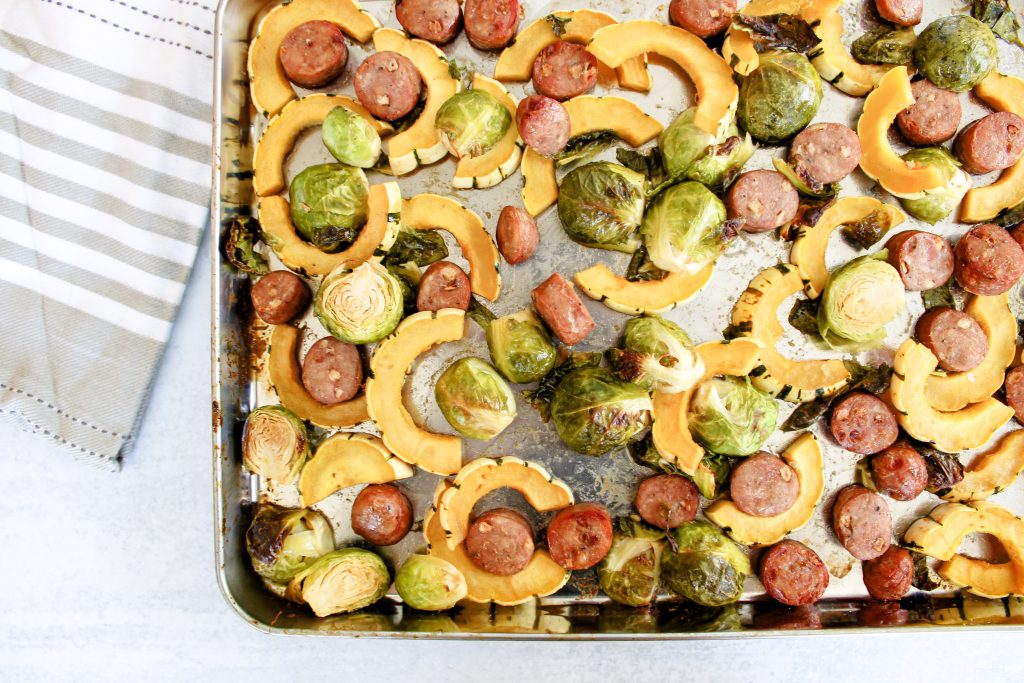Sheet pan meal with delicata squash, brussels sprouts and chicken and apple sausage