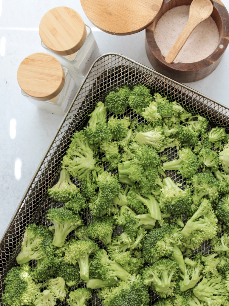 Broccoli on air fryer basket