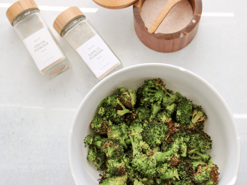 Air Fryer Broccoli in a white bowl