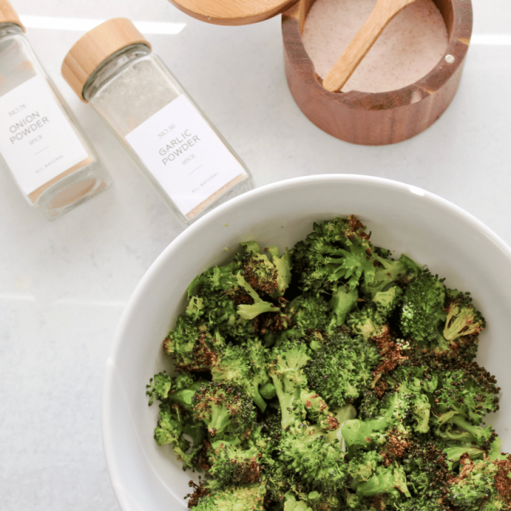 Air Fryer Broccoli in a white bowl