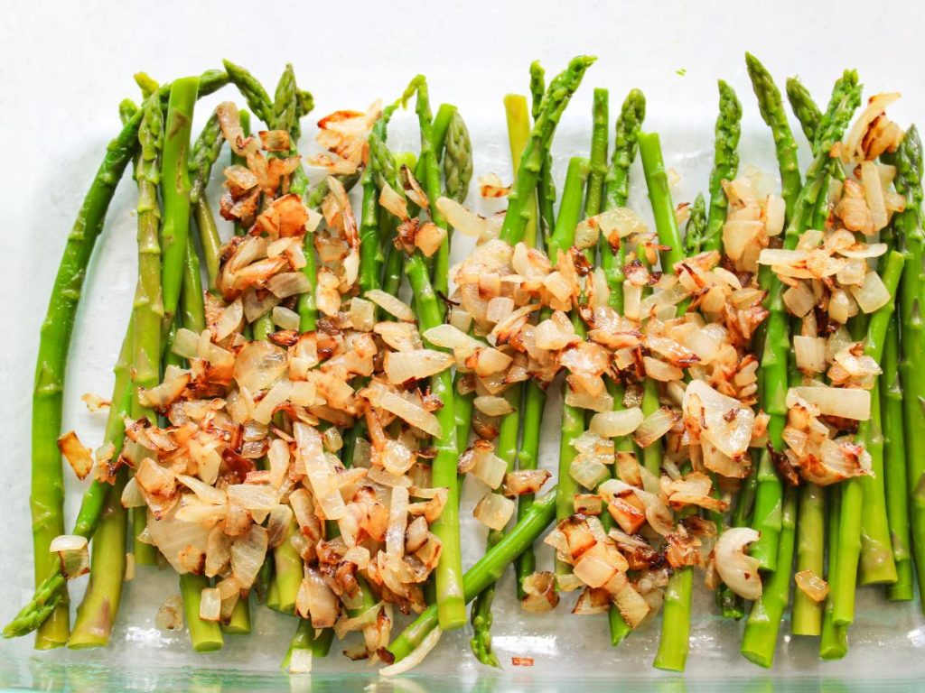 Blanched asparagus and onions in 9 x 13 pan