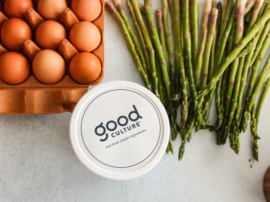 Good Culture cottage cheese next to eggs and asparagus