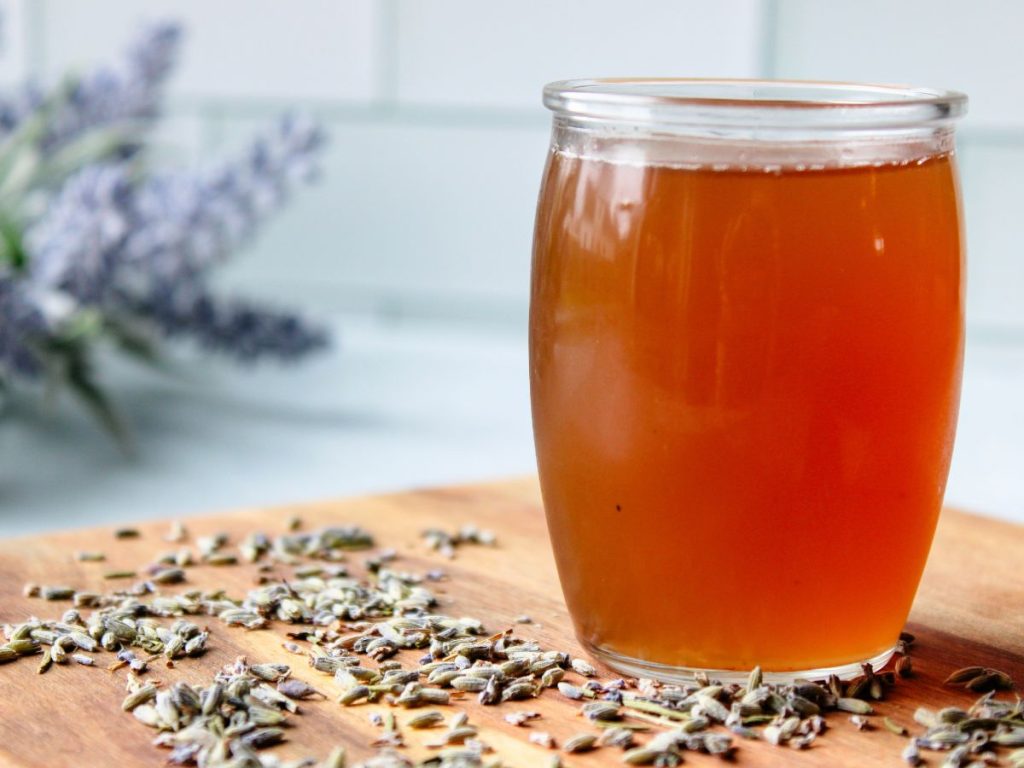 Lavender simple syrup of a wooden board with dried lavender