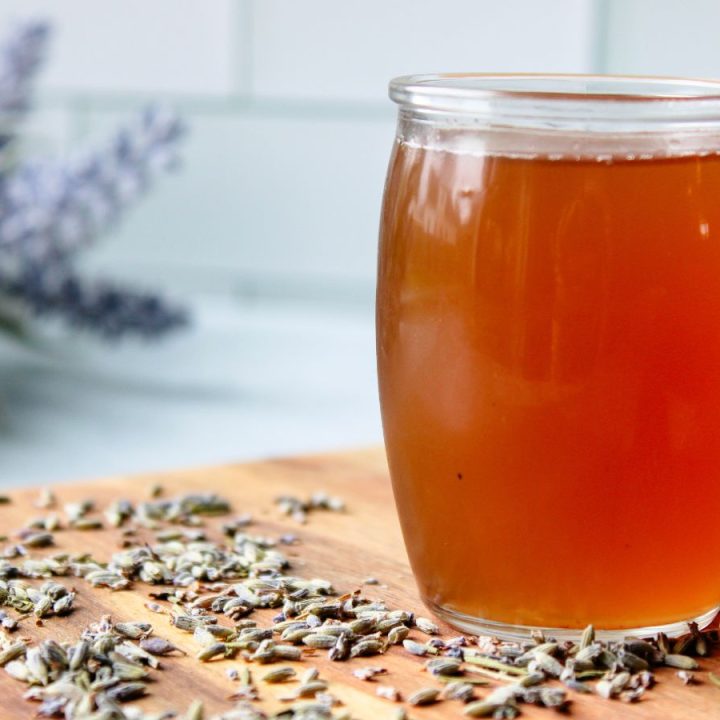 Lavender simple syrup of a wooden board with dried lavender