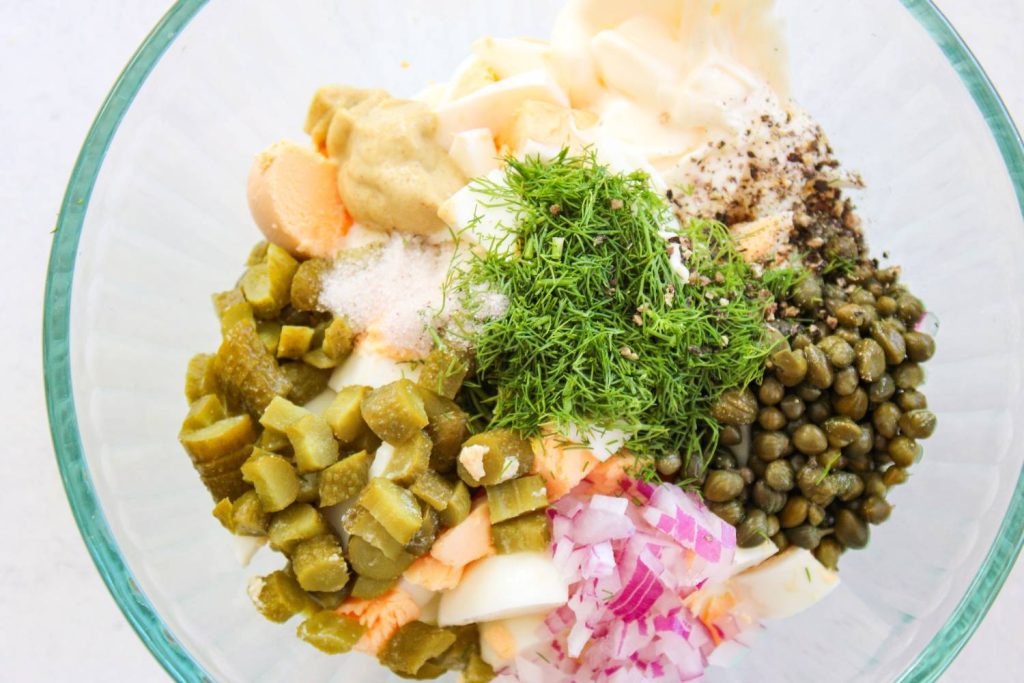 Ingredients for egg salad chopped up in a small bowl