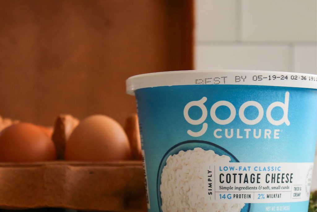 Good Culture Cottage Cheese next to a carton of eggs