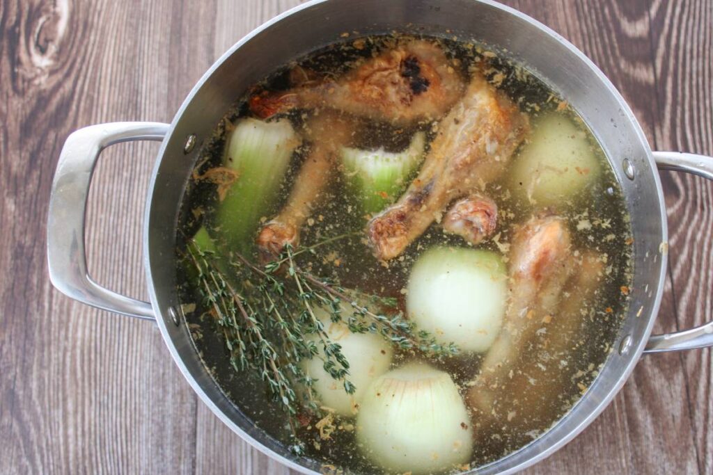 ingredients to make stock in a pot