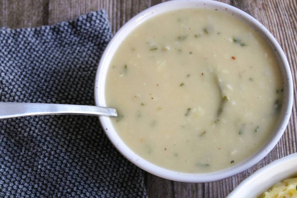 Bowl of gravy with a ladle