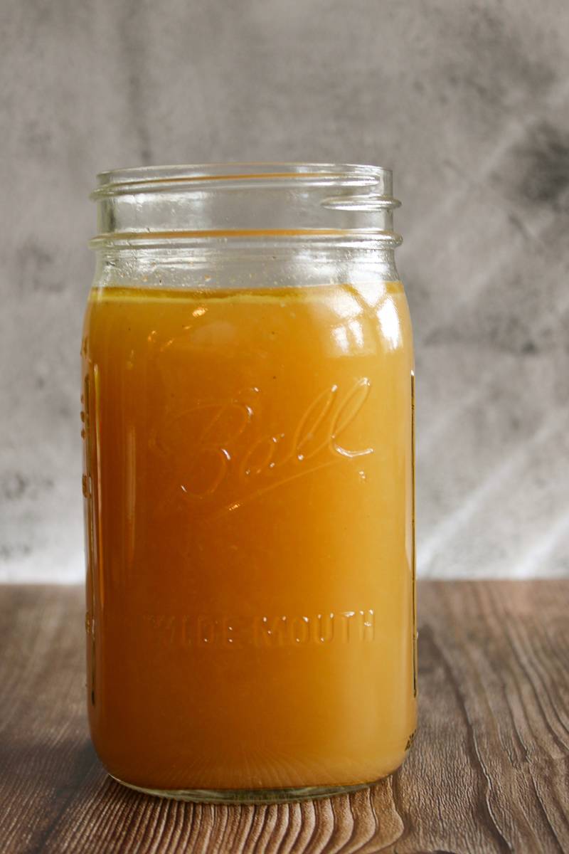 Close up on homemade stock in a jar