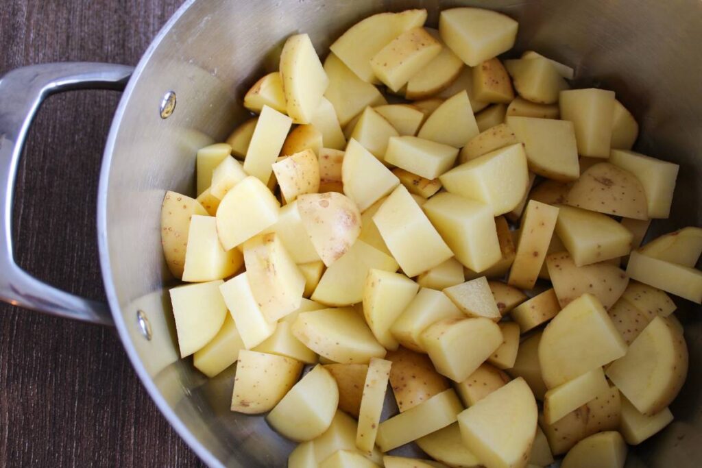 Pot with diced potatoes