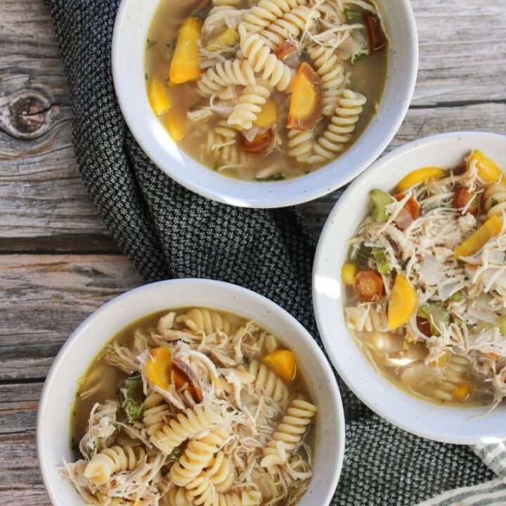 three bowls of chicken noodle soup