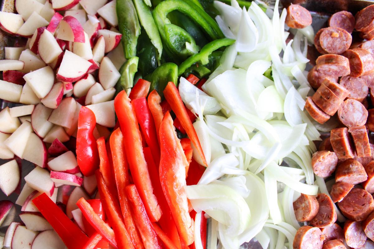 freshly sliced veggies, potatoes and sausage for the sheet pan dinner