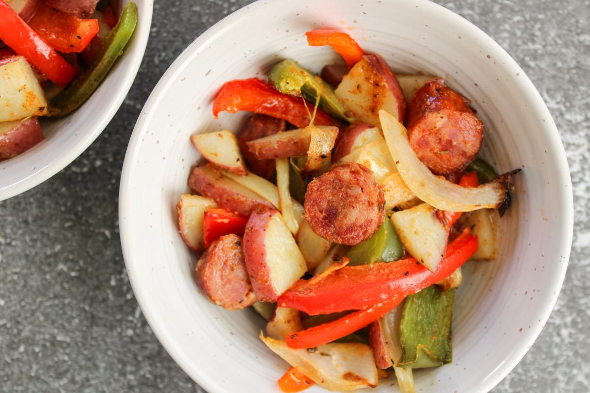 close up of a bowl of Cajun Sausage, Potato and Vegetables.